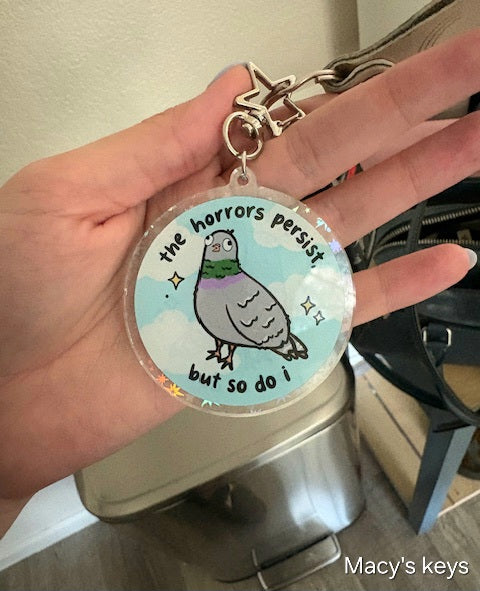 The Horrors Persist, But So Do I Keychain