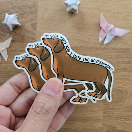 My Back Hurts and I Hate the Government Dachshund Vinyl Sticker
