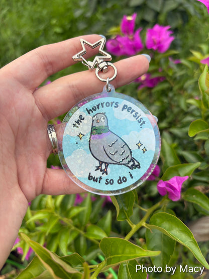 The Horrors Persist, But So Do I Keychain